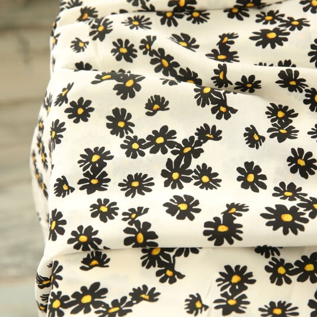 Kesämekko materiaali päivänkakkara kukka sideharso mekkokangas aurinkovoidepaita
