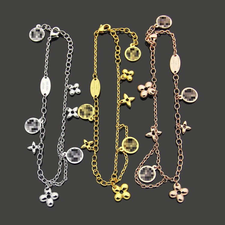 Bracelet en acier titane V quatre feuilles fleur double couche Bracelet femmes commerce extérieur multi accessoires