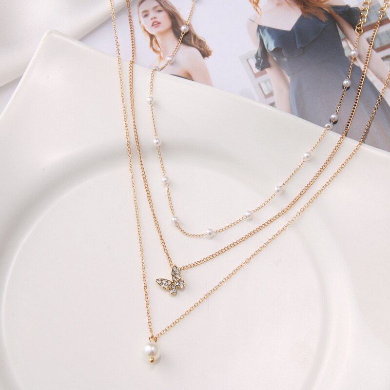 Collana con ciondolo a farfalla per donna imitazione perla farfalla pendente catena clavicola collana girocollo regalo gioielli moda femminile