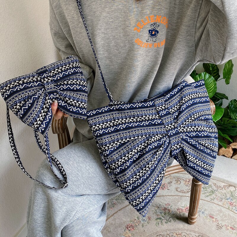 Geräumige damen-umhängetasche, schlichte einfarbige schleifen-schultertasche, Jahrgang-damen-freizeittasche.