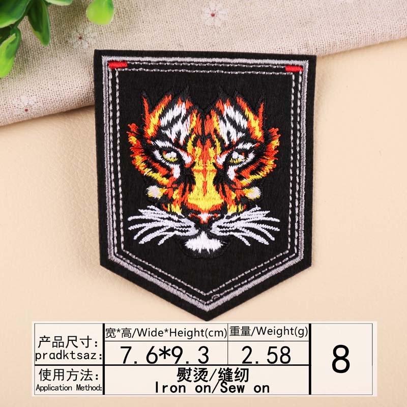 Wysokiej jakości tendencja w modzie kwiat wzór tygrysa hafty odznaka łatki DIY ubrania bagaż ozdobne łaty: Metalowy pistolet