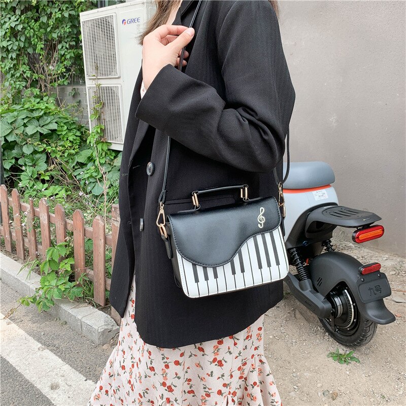 Enjoini søt piano mønster pu skinn uformell damevesker og veske skulderveske crossbody messenger bag veske