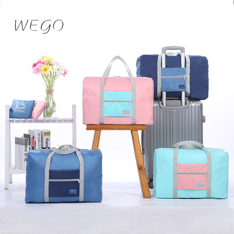 2021 local novo coreano portátil saco de viagem dustproof dobrável saco de armazenamento à prova ddustágua hit cor dobrável avião saco