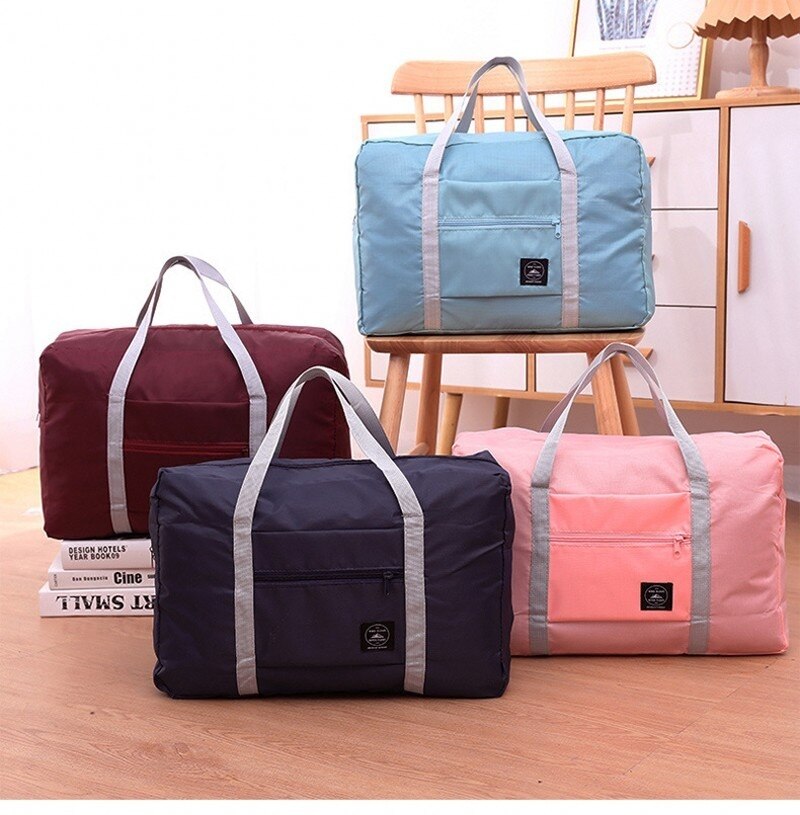 Neue Nylon Faltbare Reisetaschen unisex Große Kapazität Tasche Gepäck für Frauen Wasserdichte Handtaschen Männer Reisetaschen