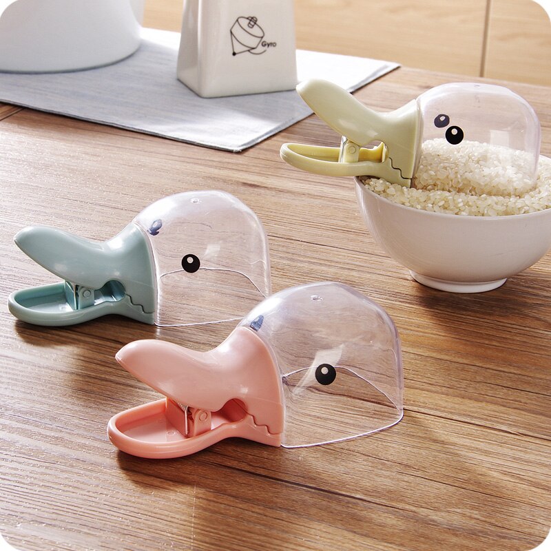 Bonita taza medidora de cereales 2 en 1 con forma de pato con clip de sellado para servir paleta de arroz de plástico para cocina, herramienta japonesa de sushi