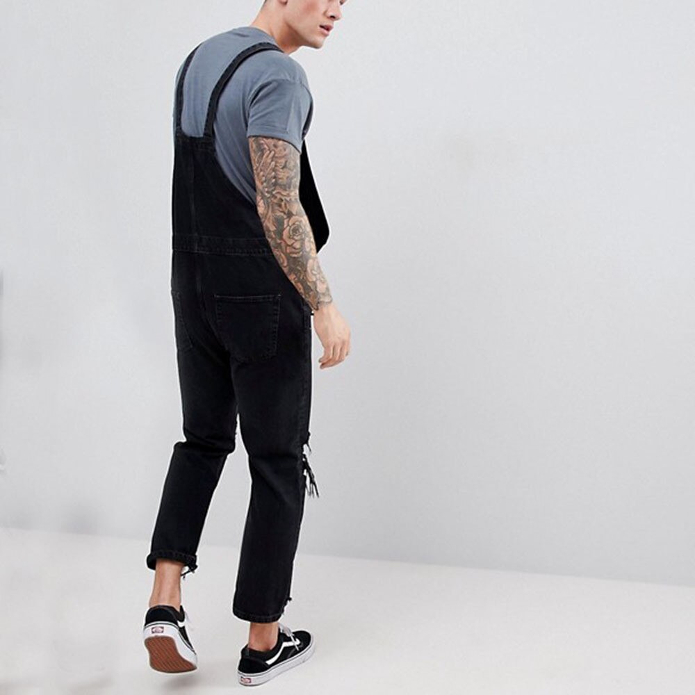 Mono vaquero rasgado hasta la rodilla para hombre, peto negro con aberturas grandes, ropa de calle, pantalones vaqueros con tirantes