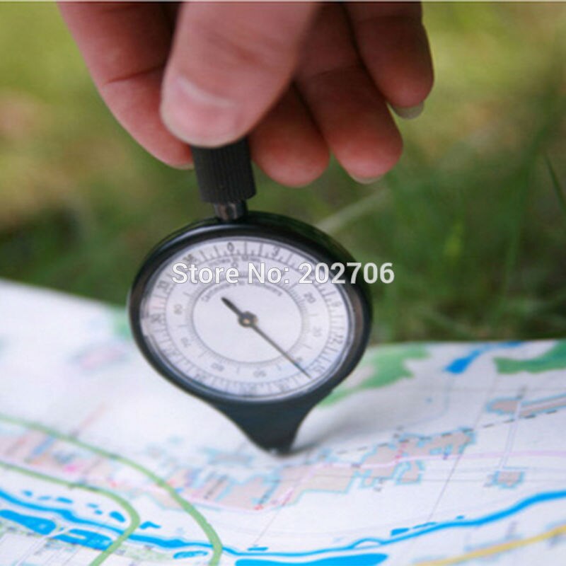 Buitenkaart meetinstrument kaart afstandsmeter meter schaal kilometerteller meetinstrument buitengereedschap kompas