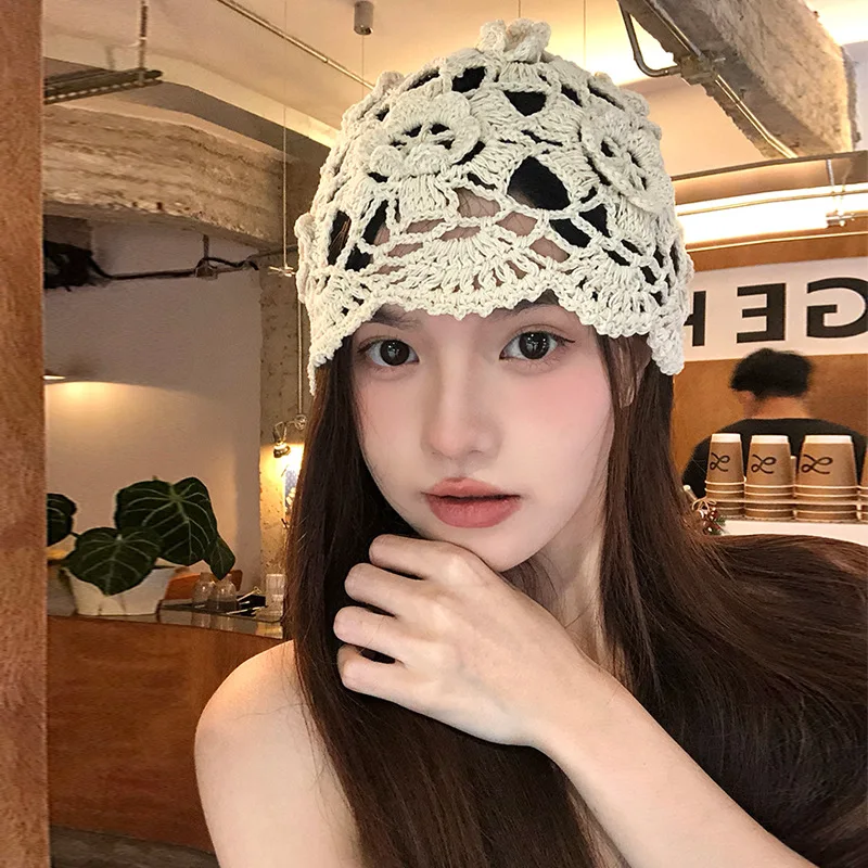 Cappello lavorato a mano all'uncinetto con fiori da donna Primavera Estate Moda versatile cappello sopra la testa sottile e traspirante con copricapo cavo