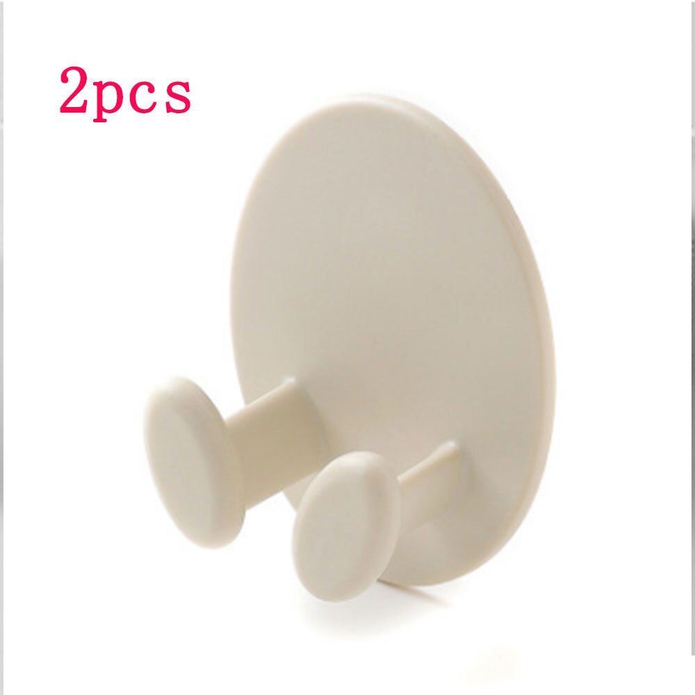 2pcs Nail-free hook hook oval socket hook power cord storage rack: apricot