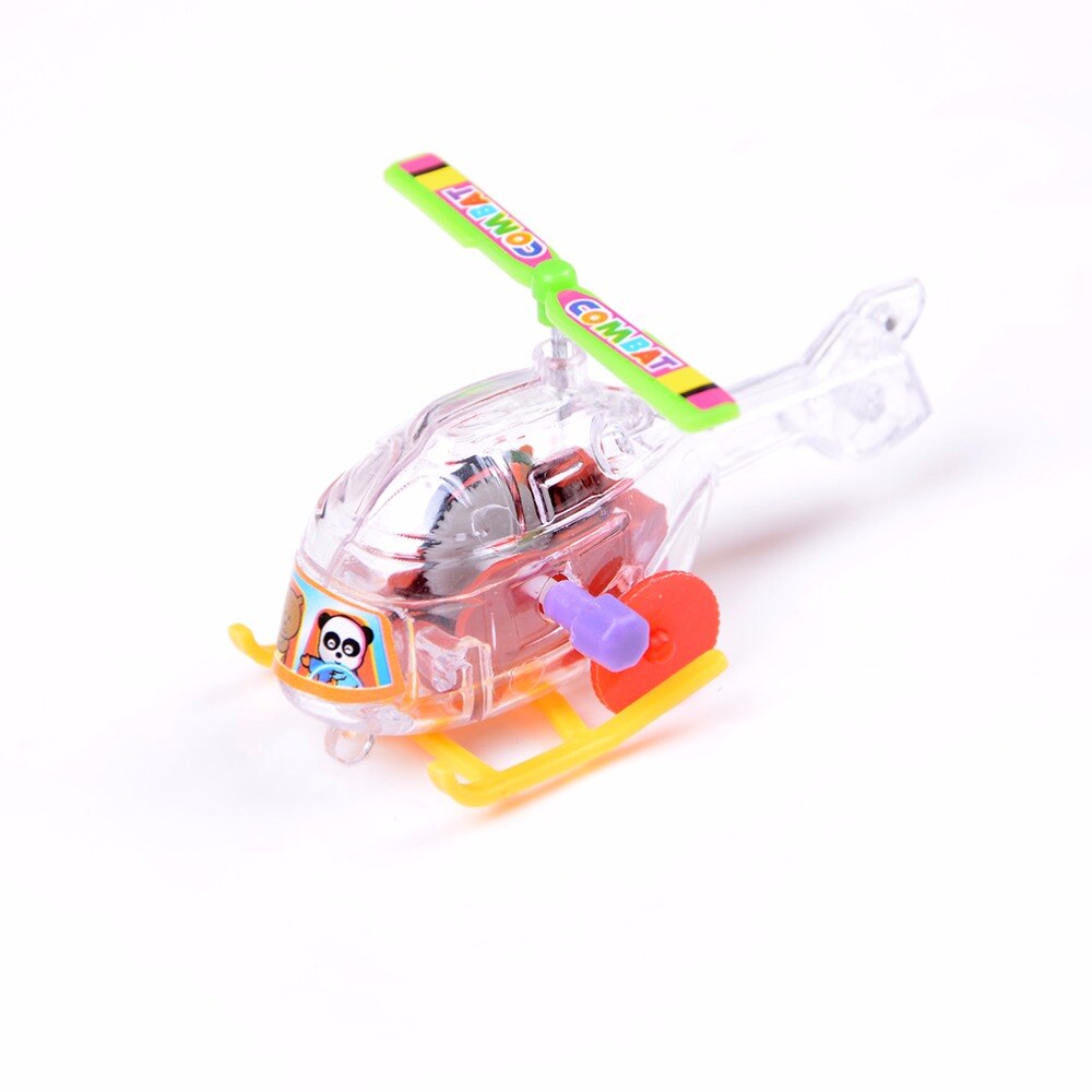 Salto kører urværk gennemsigtig fly afvikle legetøj farverige baby morsomme fly legetøj miljømaterialer