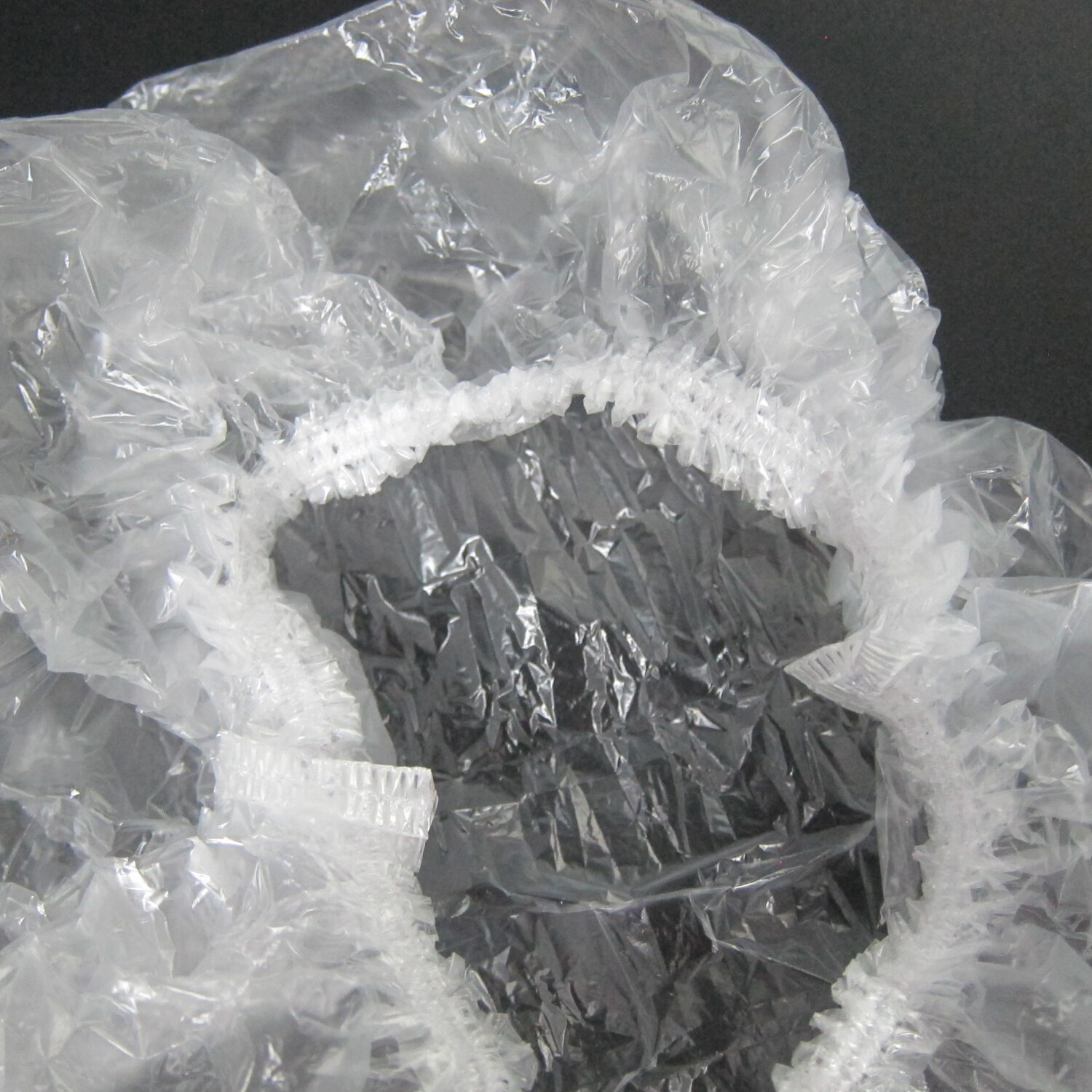 Bonnet de douche jetable en plastique, 100 pièces, pour femmes et hommes, imperméable, transparent, pour salon de coiffure, pour hôtels, produits de salle de bains