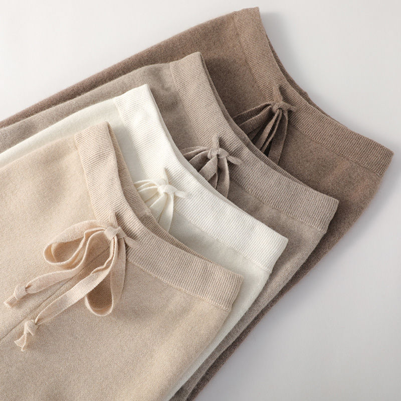 Pehmeät neulehousut naisten syys-/talvivaatteet riippuvat neulehousut leveälahkeiset valkoiset lattiahousut suoralahkeiset housut