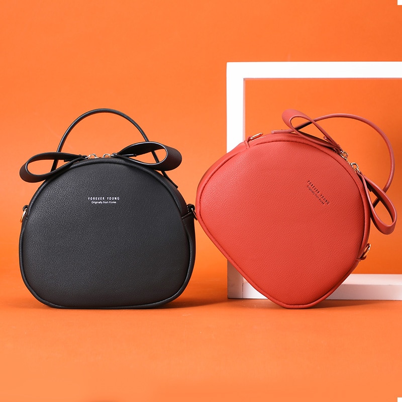 Chaude circulaire femmes Sac à bandoulière en cuir femmes bandoulière sacs de messager Sac femme ronde Bolsa dames Sac à main mignon fourre-tout