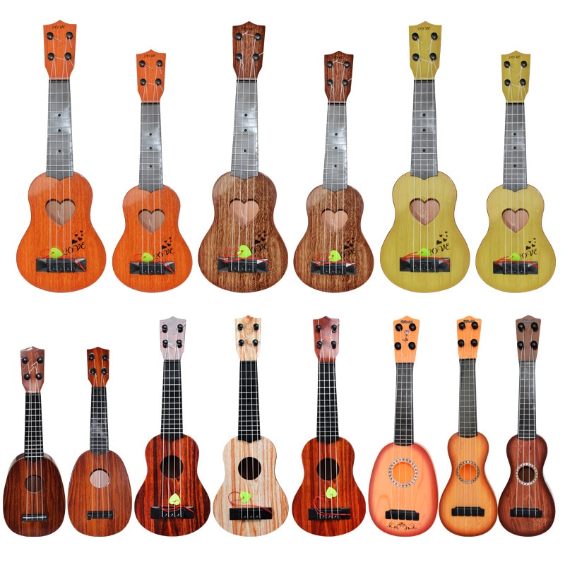 Nuovo Principiante bambini chitarra Ukulele Strumento Musicale Giocattolo Educativo Per I Bambini giocattoli interessanti Regalo Regalo Per Bambini