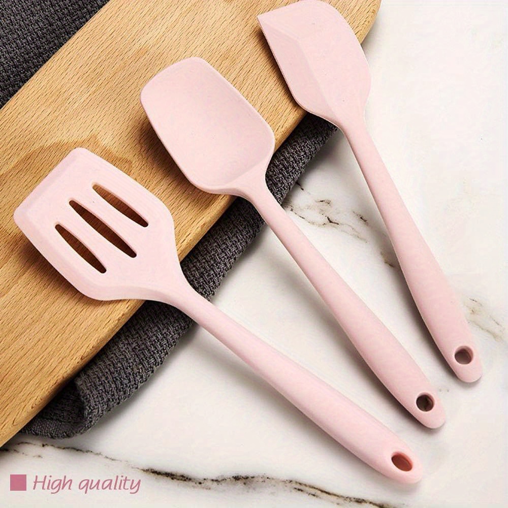 Five piece set of rose gold and pink kitchen utensils, mini silicone kitchen tools, mixing spatula, spoon, and slotted spatula