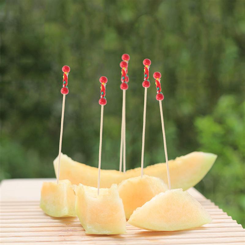 Prikkers voor eten, cocktailfruit, hapjes, drankprikkers, stokjes, wegwerphouten tandenstokers, feestbenodigdheden (ongeveer 100 stuks, dubbele rode kralen)