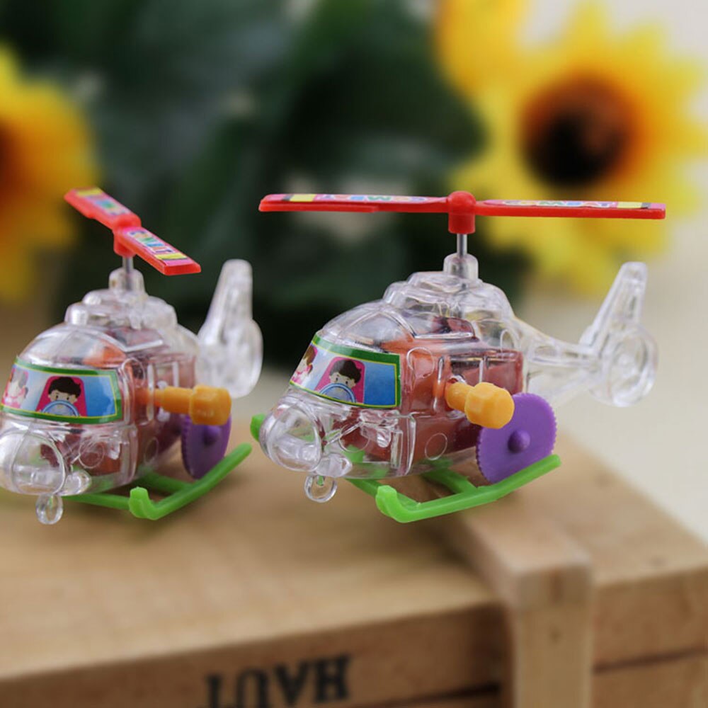 Avión cuerda-Up reloj de juguete aviones Mini aviones juguetes color plástico avión juego divertido niños al aire libre helicóptero