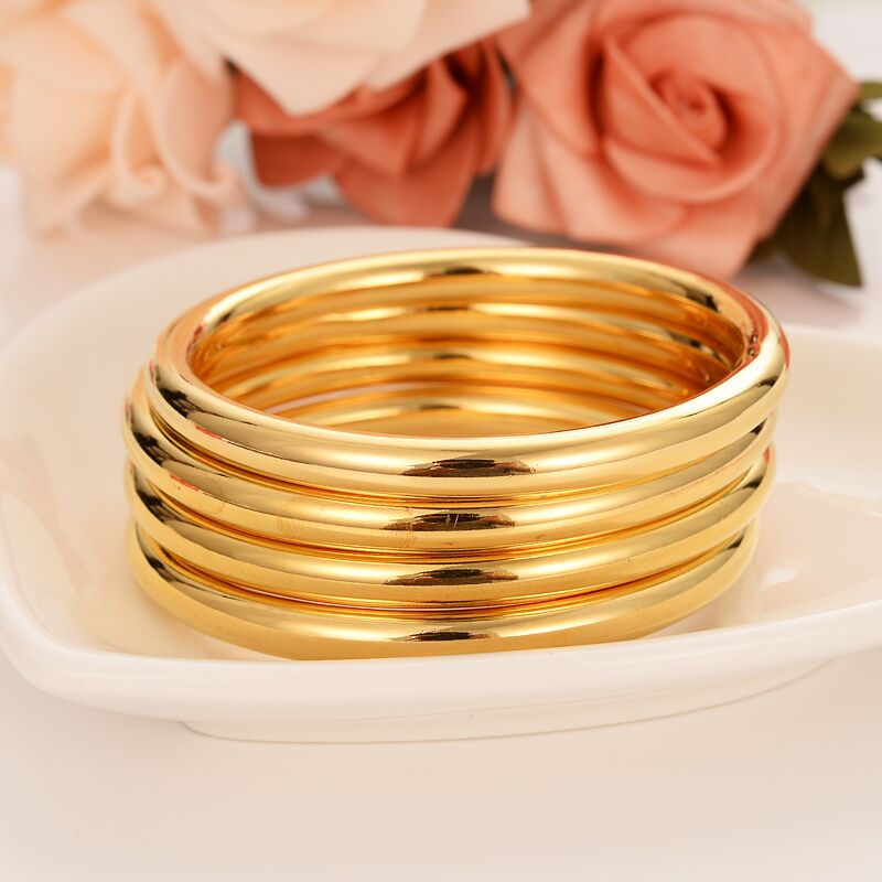 4- teiliges set aus dubai-glasur-armreifen, 24 k feine gold-gf-dubai-armbänder, afrikanisch-arabische artikel