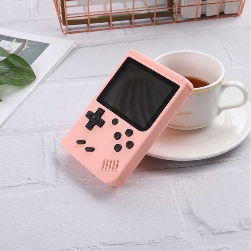 Consola de bolsillo 800 juegos clásicos FC para niños y adultos, batería recargable de 1020mAh, Mini consola de juegos portátil: Pink