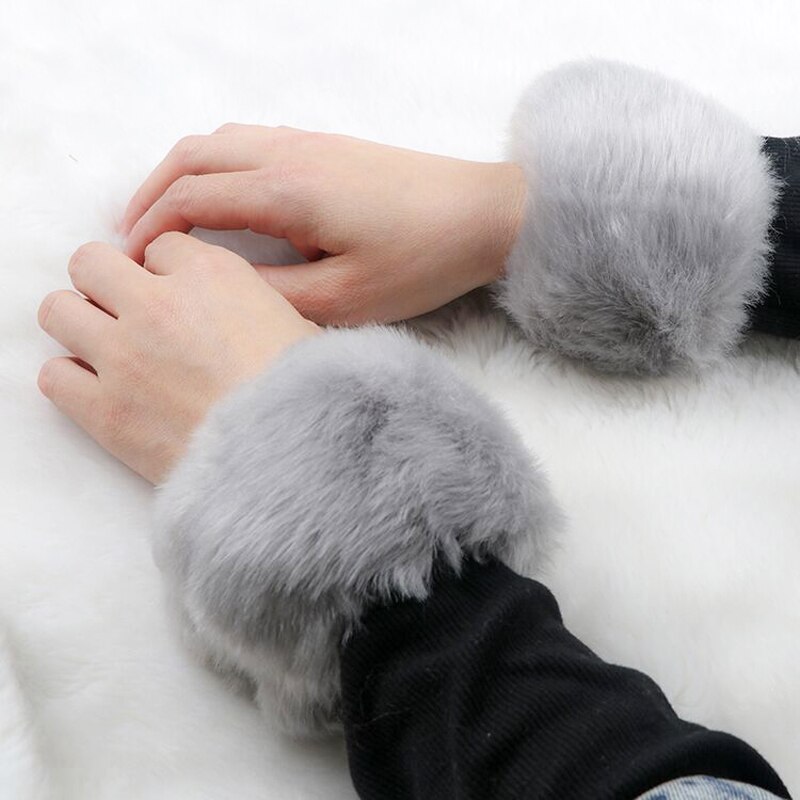 Une paire de gants de poignet en fausse fourrure pour femme et fille, manchettes élastiques et souples, en peluche et à bras épais, accessoires chauds d&#39;hiver