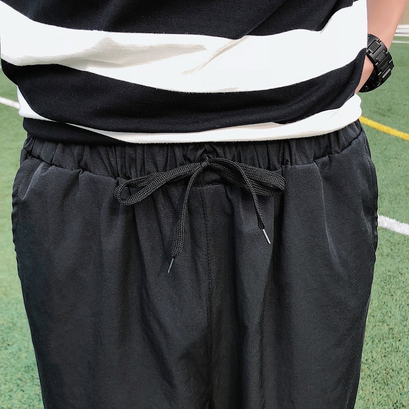 Męskie spodnie długości łydki spodnie z szerokimi nogawkami luźne rekreacyjne męskie koreańskie stylowe solidne cienkie oddychające retro Harajuku modny szyk Ulzzang