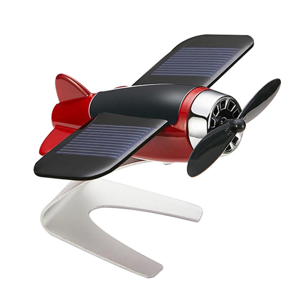 Bil dekoration aromaterapi fly dekoration skridsikker måtter legering solenergi rotere fly instrumentbræt solid bil styling