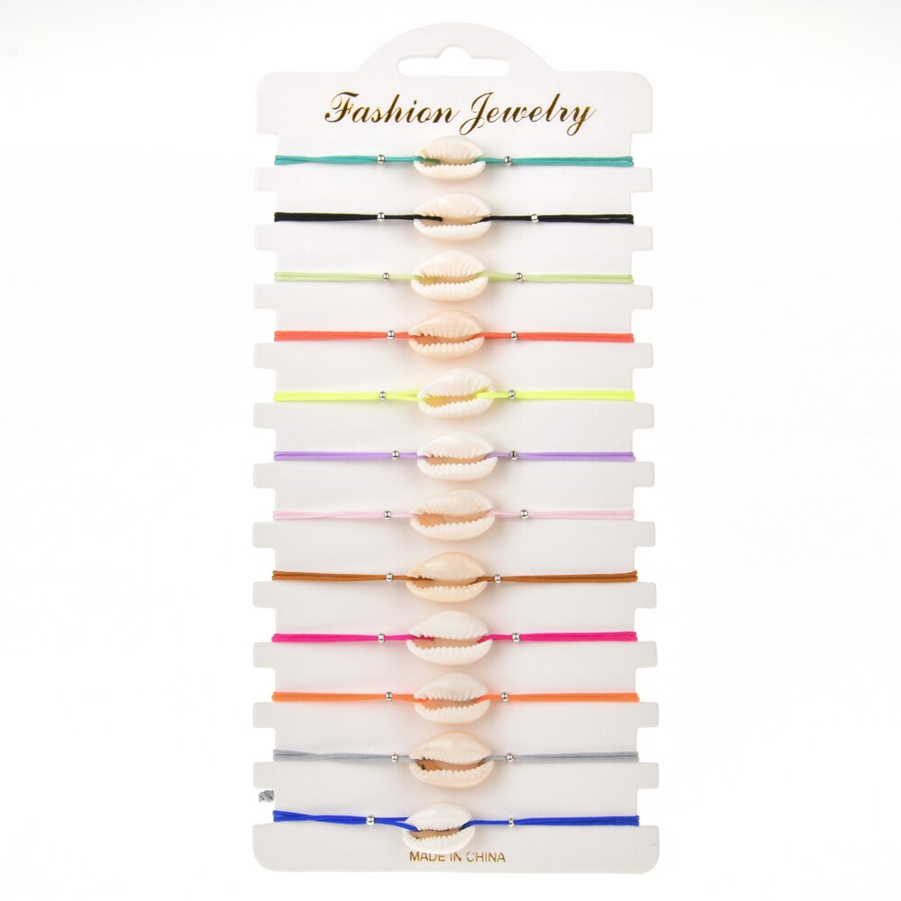 Pulsera de cuerda trenzada con conchas de cristal para mujer, brazalete ajustable hecho a mano con de Calavera, mariposa y mal de ojo, 12 unids/lote