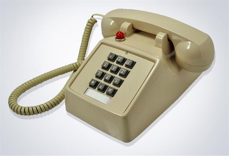 Old button type antique retro landline antique telephone American mechanical ringing European telephone: Beige