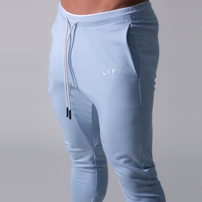 Pants men's jogging fitness track pants men's Korean casual slim hit color jogging trousers