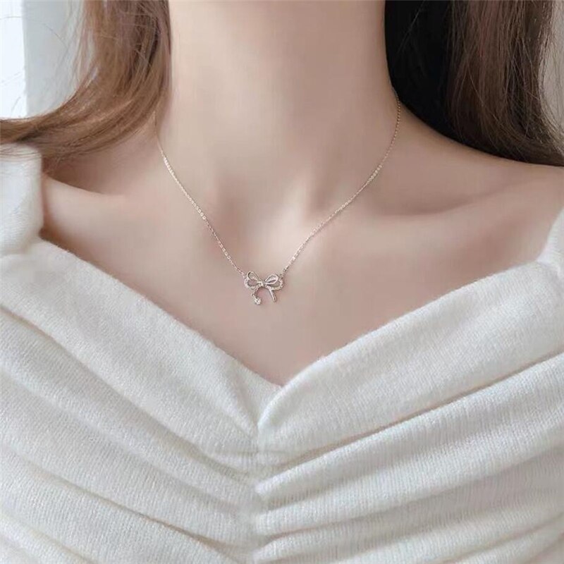 Unique mémoire brillant papillon frais Bow 925 argent Sterling clavicule chaîne femme collier SNE537