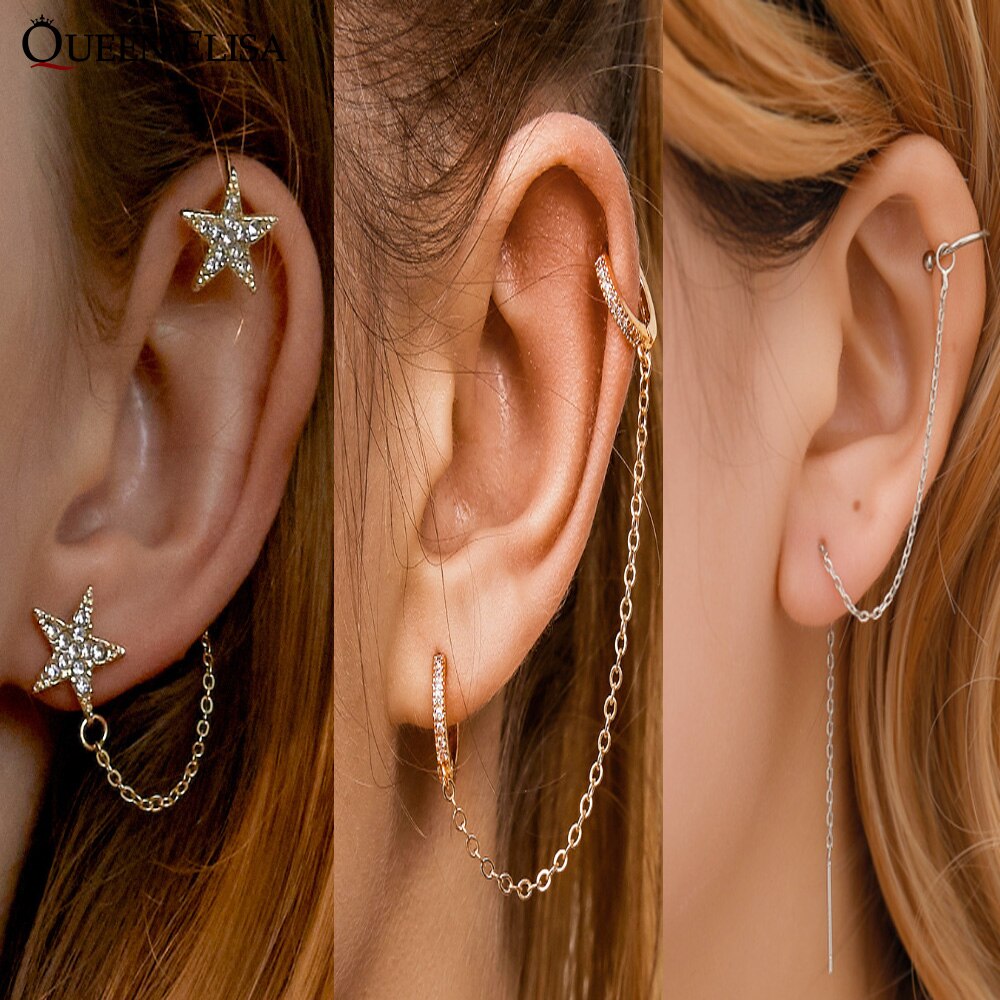 Stainless steel lange gouden oorbellen met tijgeroog en bloem bedels