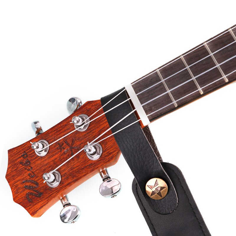 Soporte de correa de cuero para guitarra, botón de bloqueo de seguridad con cierre de Metal fuerte para guitarra eléctrica acústica, accesorios de bajo clásico, 1 ud.