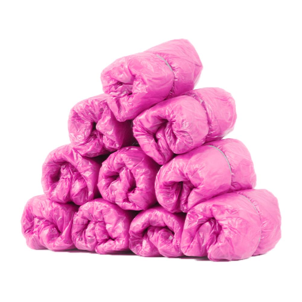 100 stk / pakke engangs lyserøde sokker vandtæt plast skoovertræk mudderbestandige regnsko boot cover blå / pink sko tilbehør: Lyserød
