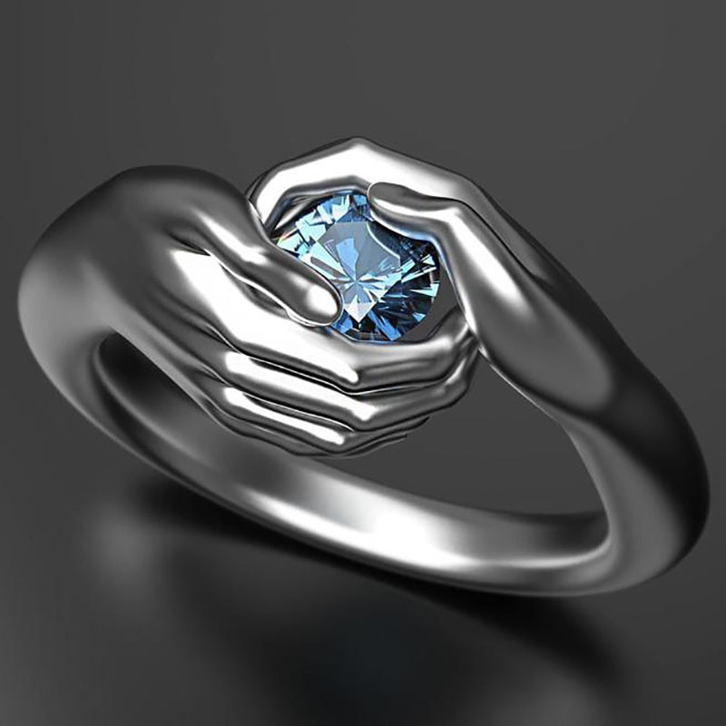 Anello di zircone di cristallo blu tenuto in mano di Design unico per le donne regalo di san valentino classico coppia abbraccio anello di fidanzamento di nozze gioielli