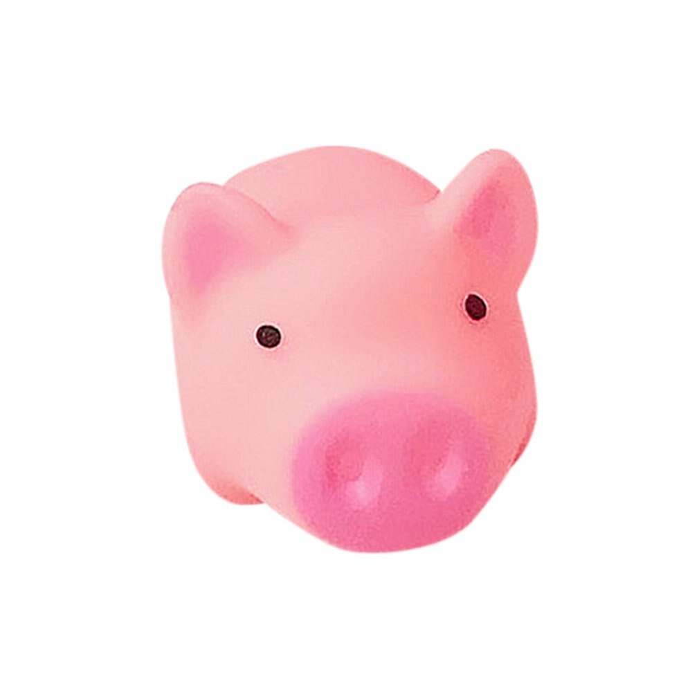 Cartoon zacht schattig roze varkentje dat kinderspeelgoed op de proef stelt ventilerend varkentje dat muziek knijpt genaamd decompressie-ventilatie-speelgoed
