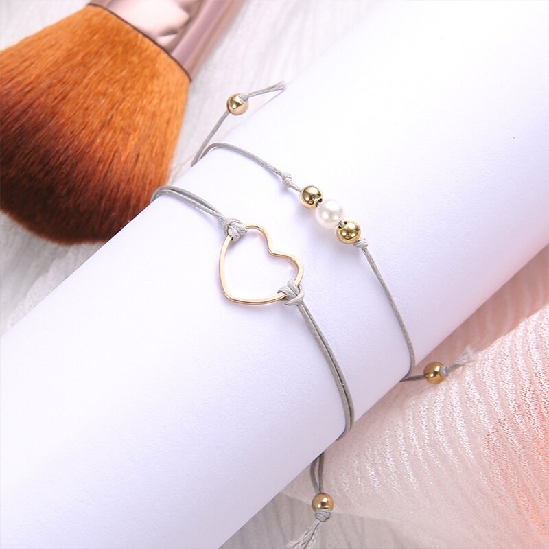 Bracciale regolabile con perle a cuore semplice da 2 pz/set da donna bracciale in pelle intrecciata con perline nero grigio