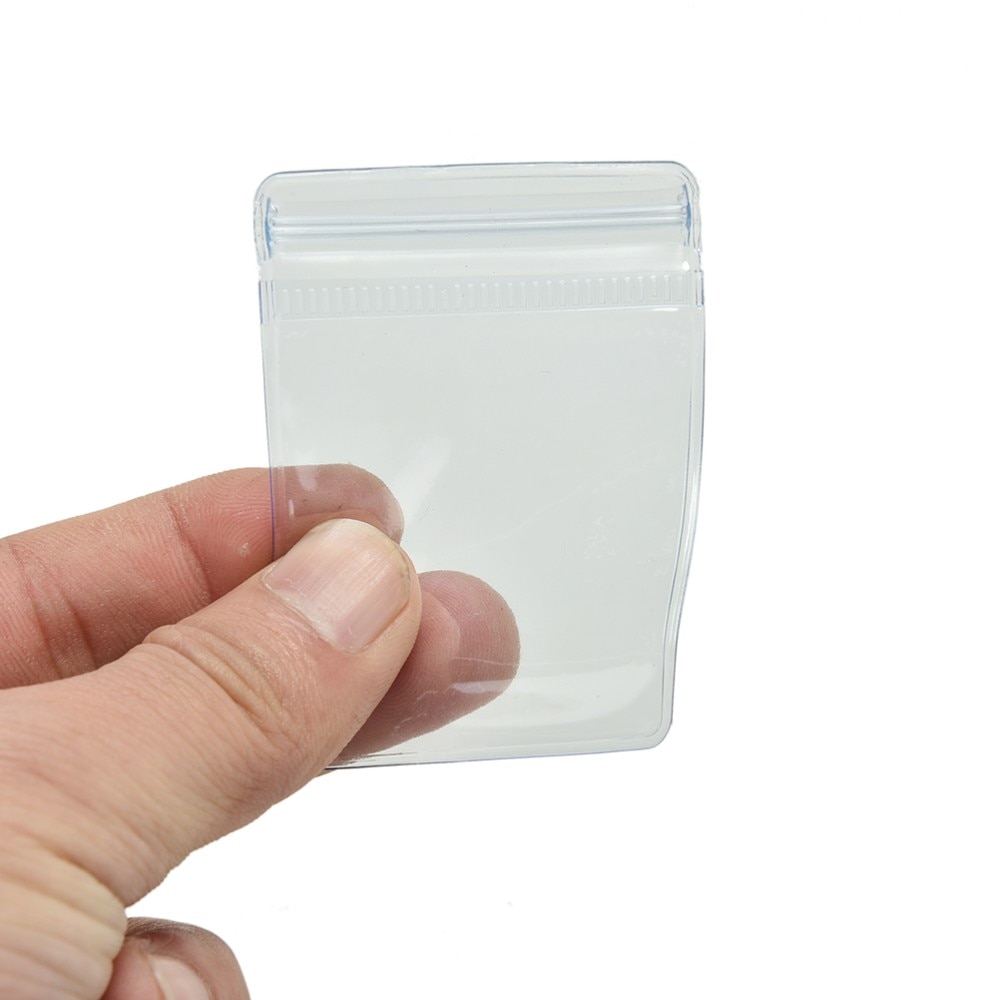100Pcs/lot Clear PVC Plastic Coin Bag Case Wallets Storage Envelopes Packaging Bags 70 x 50 mm