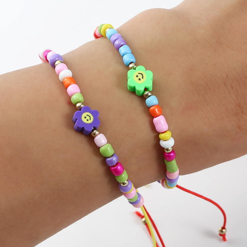 Conjunto de pulsera trenzada con cuentas para mujer y niño, brazalete de cuerda ajustable con abalorios de flores de concha de colores, 12 Uds./lote
