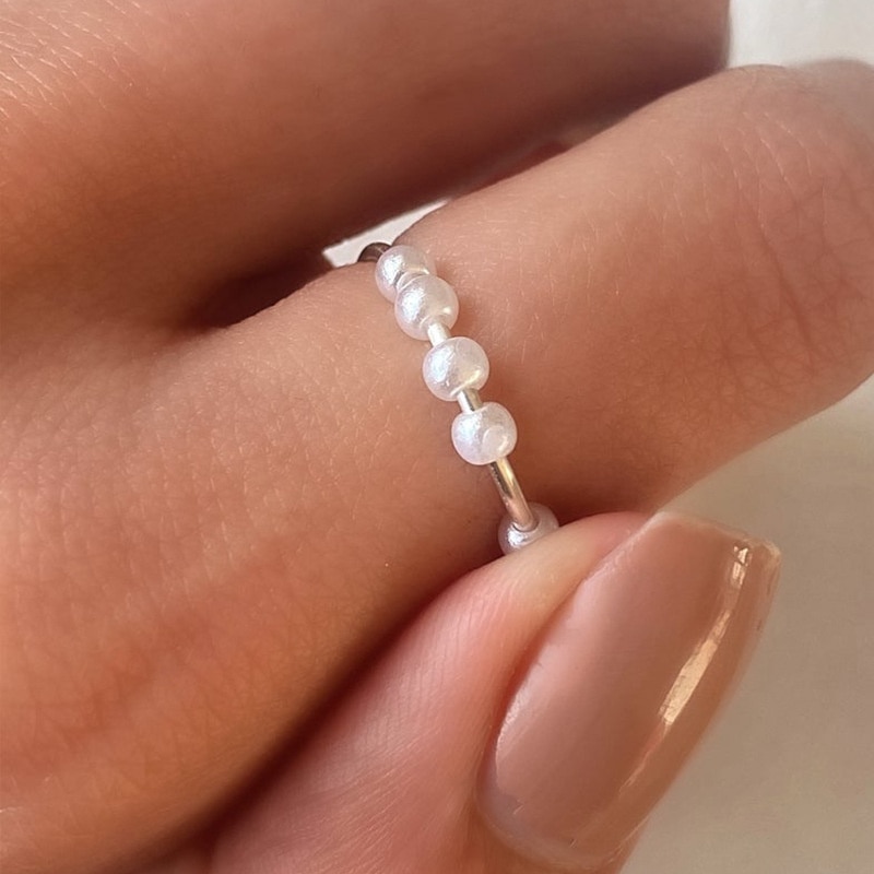 Anillo giratorio de perlas de imitación para chica y mujer, anillo antiestrés, giratoria libre, para ansiedad