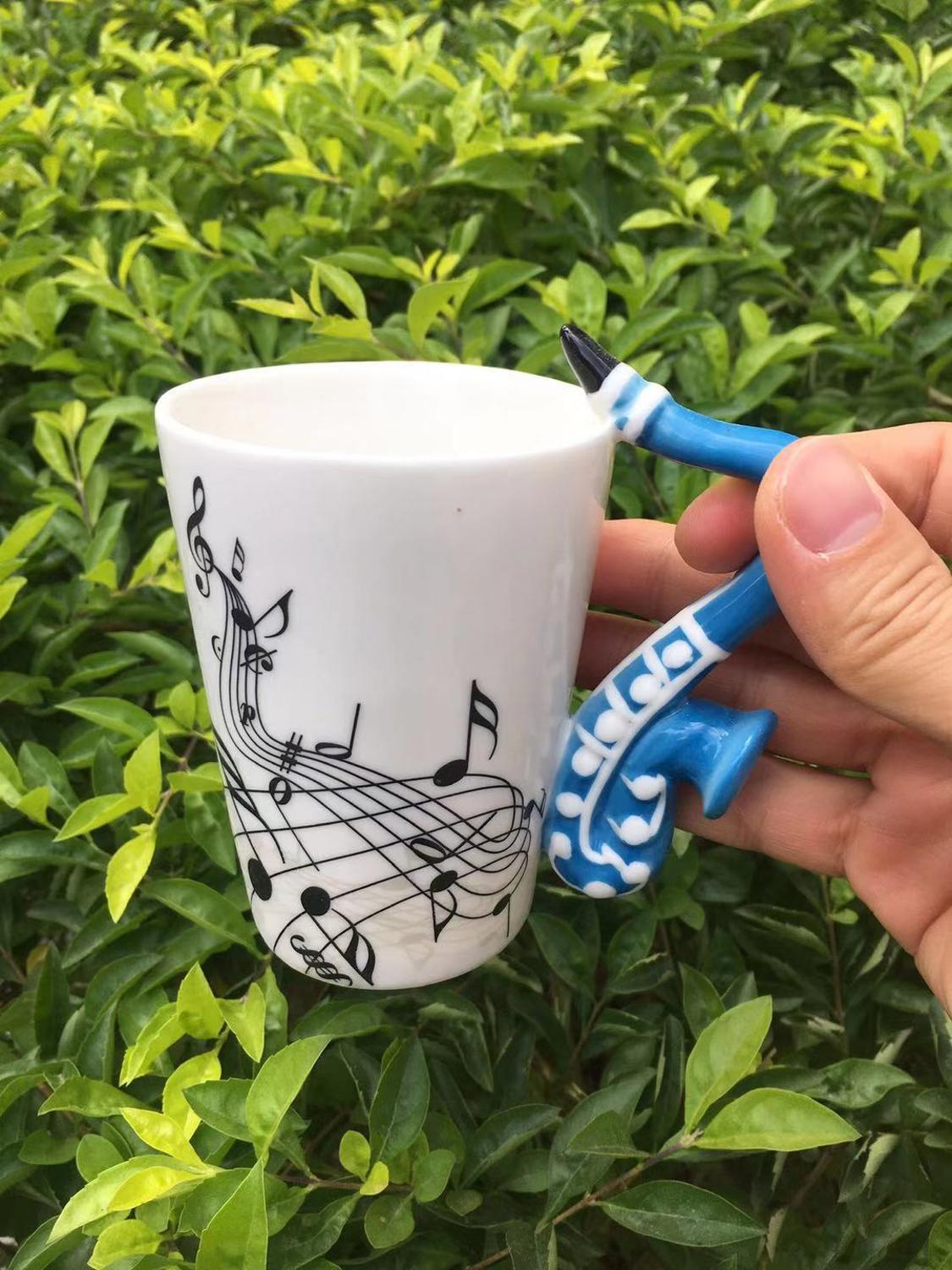 Instrumento musical de cerámica de , tazón taza con mango,