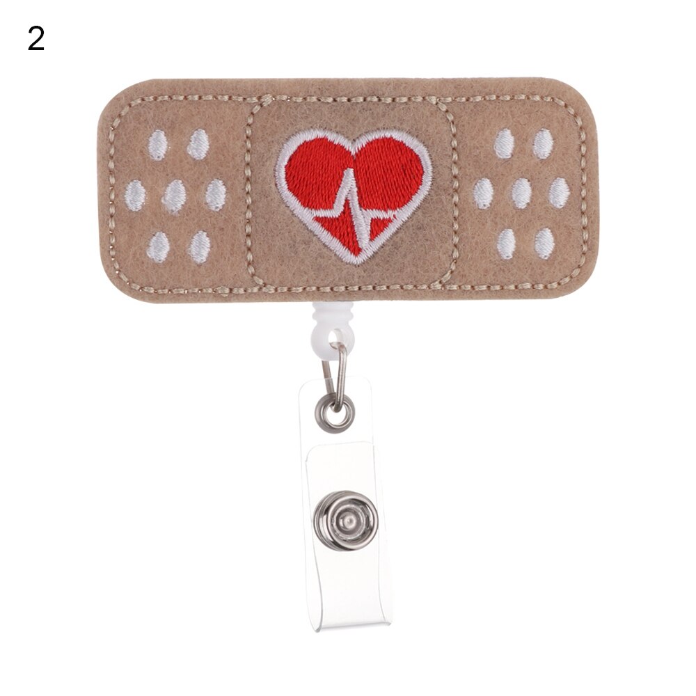 1pc klud sygeplejerske udtrækkeligt badge pull spænde hjul clip sød tegning bandage stil studerende id-kort badge holder: 2