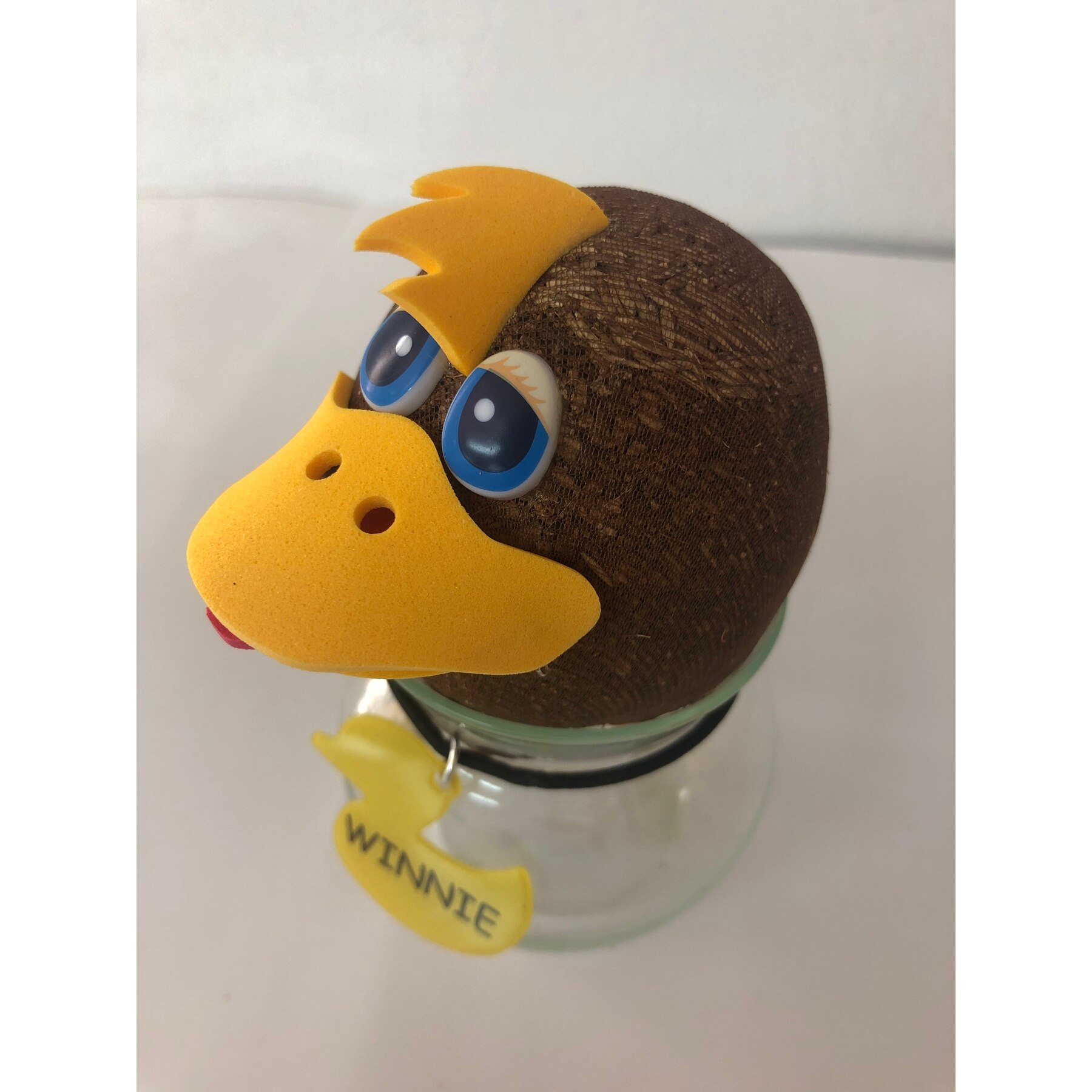 Muñeco crecepelo de césped artificial