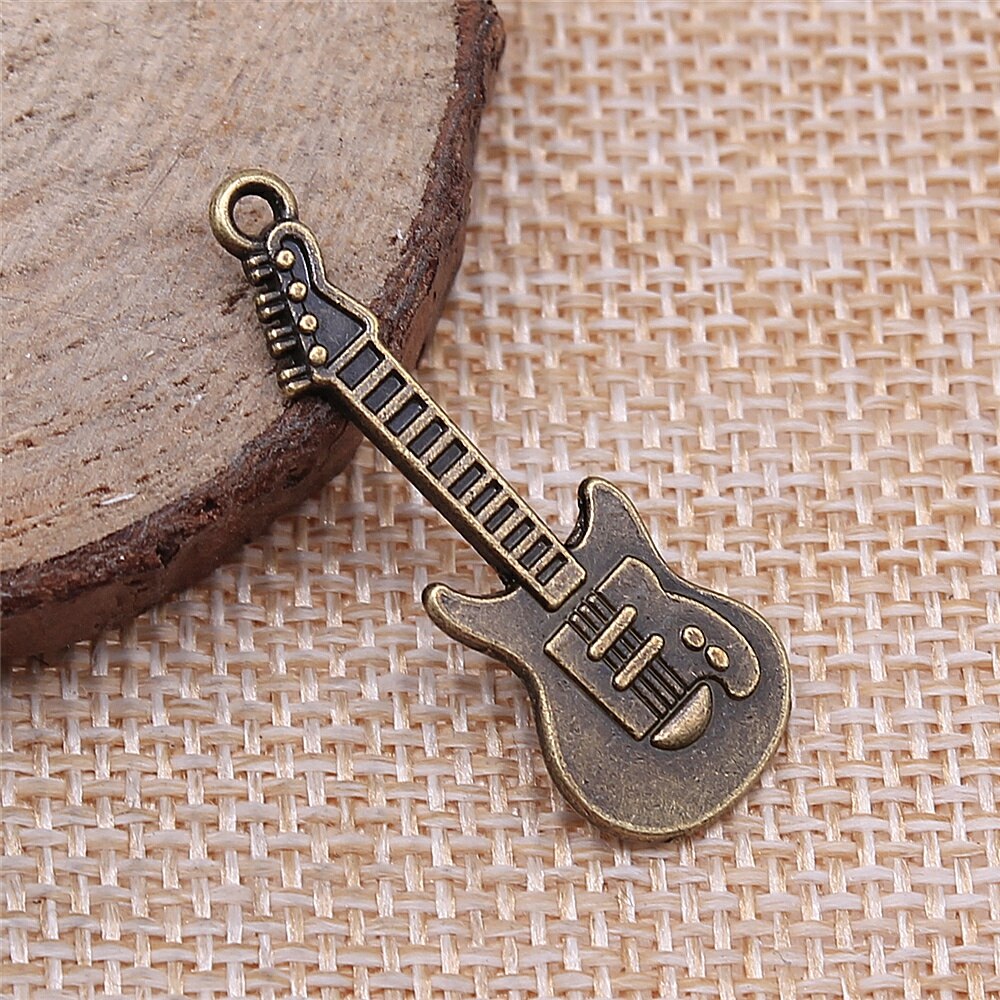 Wysiwyg 10Pcs Charms Electic Gitaar 35X12Mm Antiek Maken Hanger Fit Vintage Tibetaans Zilveren Kleur Diy Handgemaakte sieraden: Antique Bronze Plated