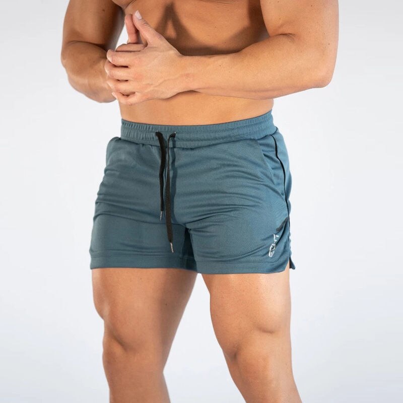 muscle fitness fitness sports casual men's shorts European and American trend running training breathable fitness pants: XXL / Blue
