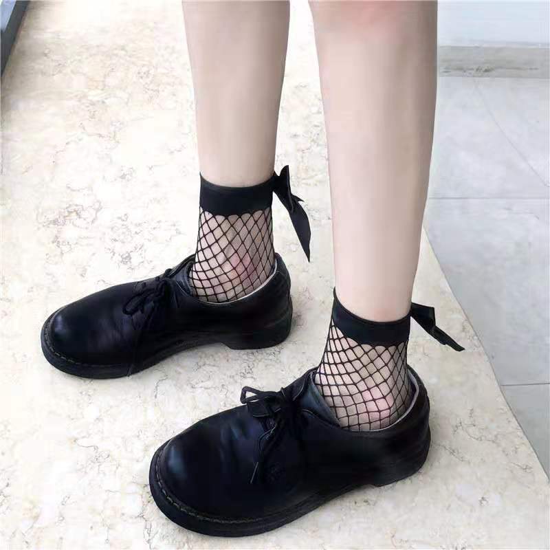 Calze da ragazza rete da pesca fiocco Lolita carino corto principessa dolce ragazza estate calze a rete calze donna maglia bambini