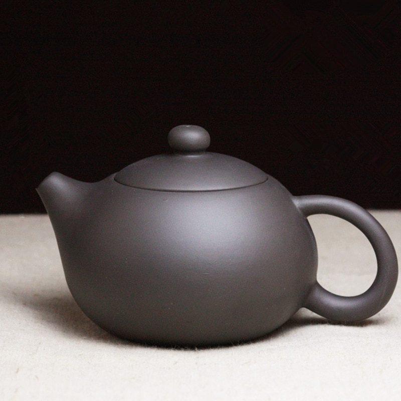 Op verkoop Chinese kungfu thee pot kleine size yixing paarse klei pot bal infuse gaten China thee brouwer pot van thee