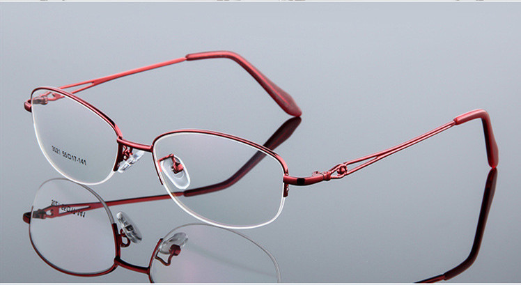 Gafas ópticas de aleación de titanio para mujer, montura ultraligera para miopía, gafas de medio borde: Red