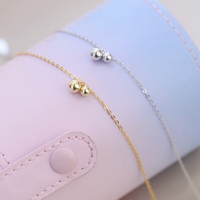 925 exquisite fußkettchen aus sterlingsilber mit kleinen runden perlenanhängern – schlichter, sommerlicher boho-schmuck für damen.