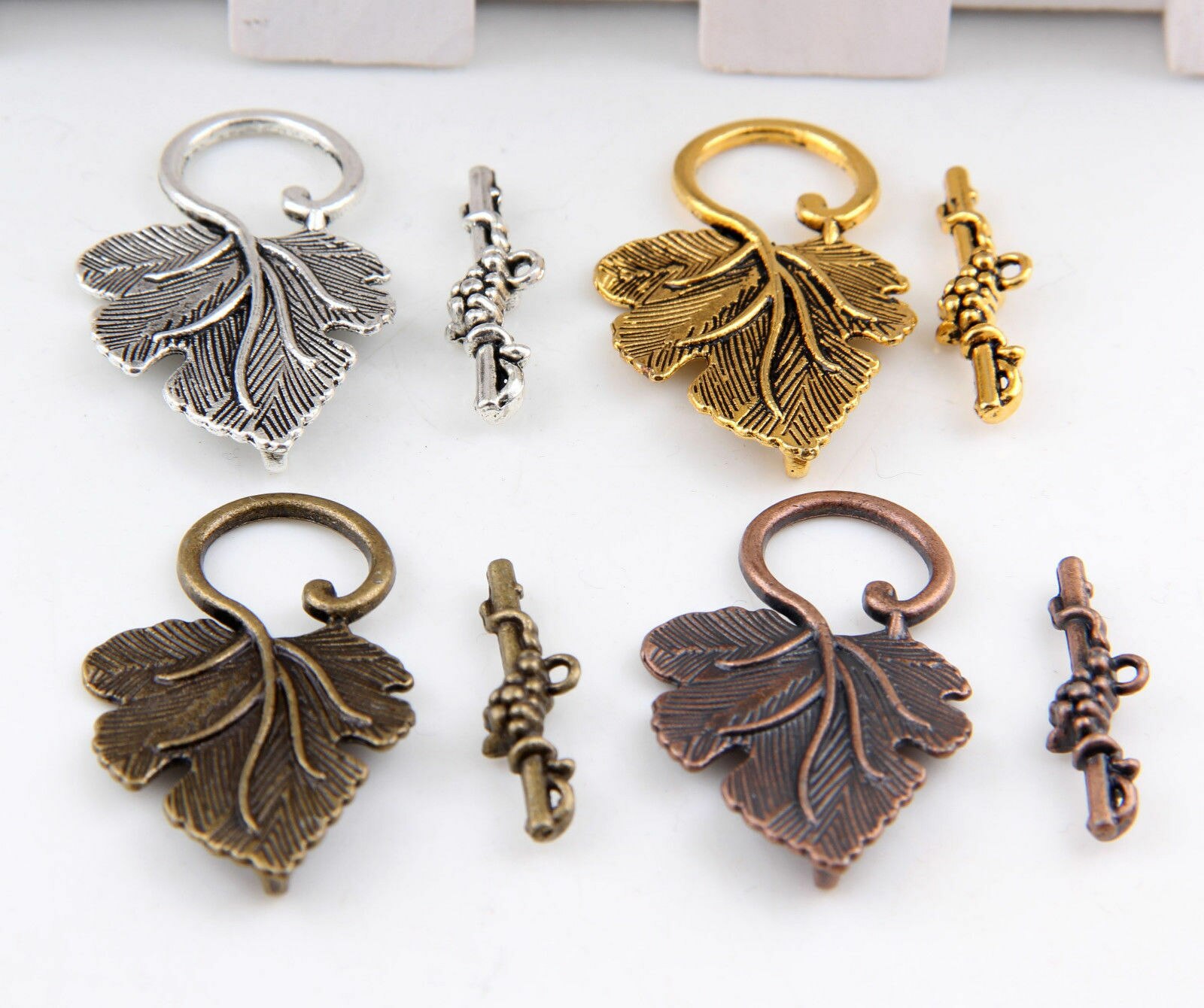 10 stuks druivenblad-sluitingen voor het vinden van sieraden, het maken van doe-het-zelf armbanden en kettingen