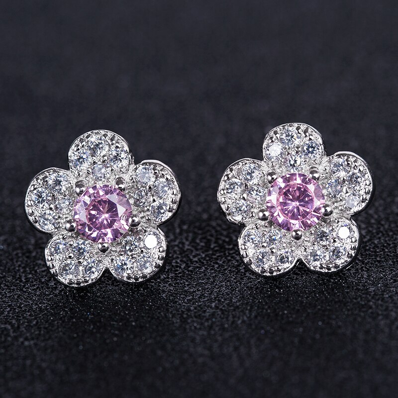 Huitan-pendientes de planta romántica para niña, con forma de flor pequeña Simple con forma de flor, aretes de tuerca de circón cúbico blanco rosa claro